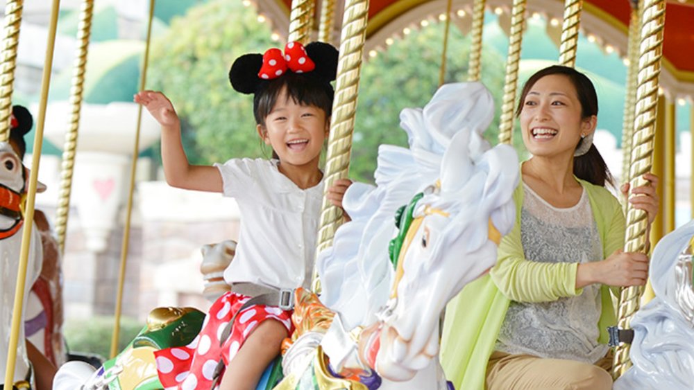 Hop on a carousel at Disneyland and don the signature Minnie ears with a red bow!