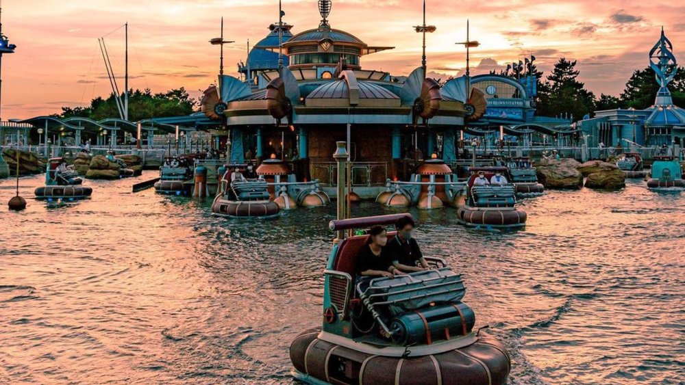 Time your Aquatopia ride around sunset for the best views of the lit-up attractions and the stunning sky. Credit: bikki_disney
