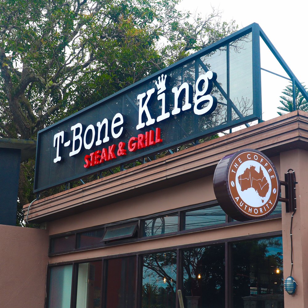 T-Bone King Steak and Grill red and white signage