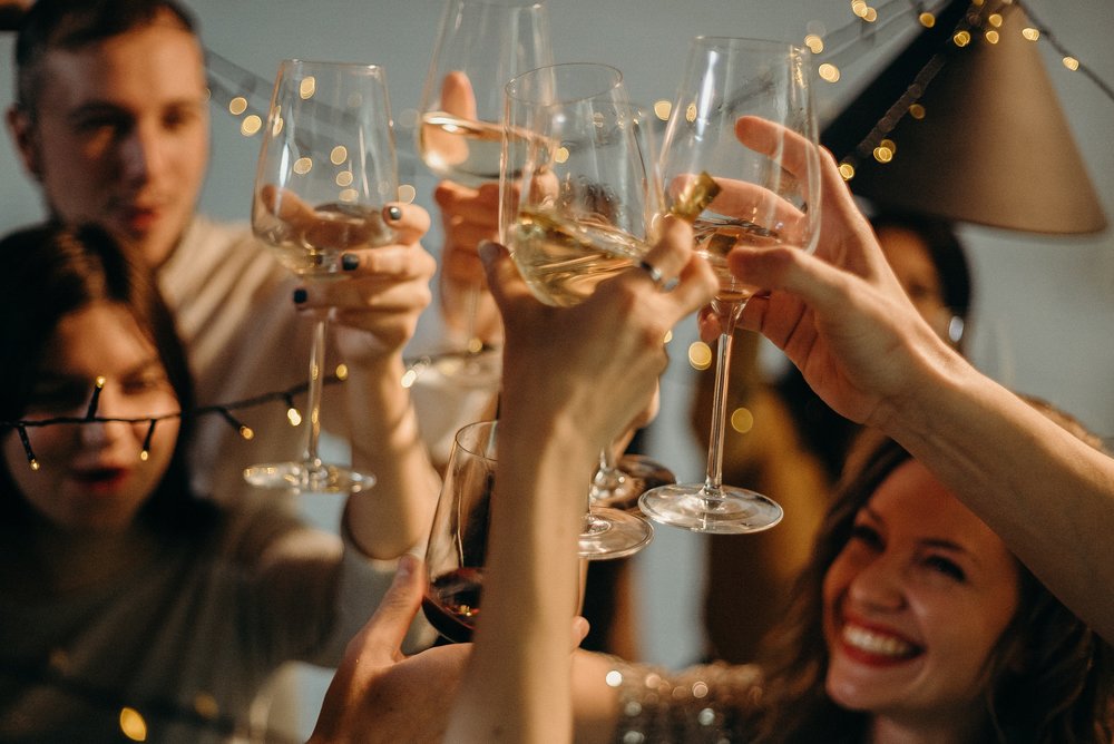 People toasting wines