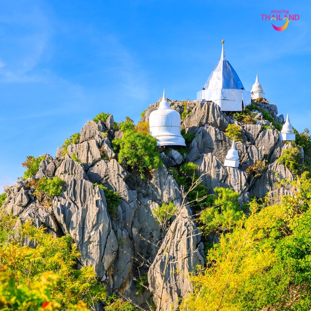 White pagodas on top of mountain