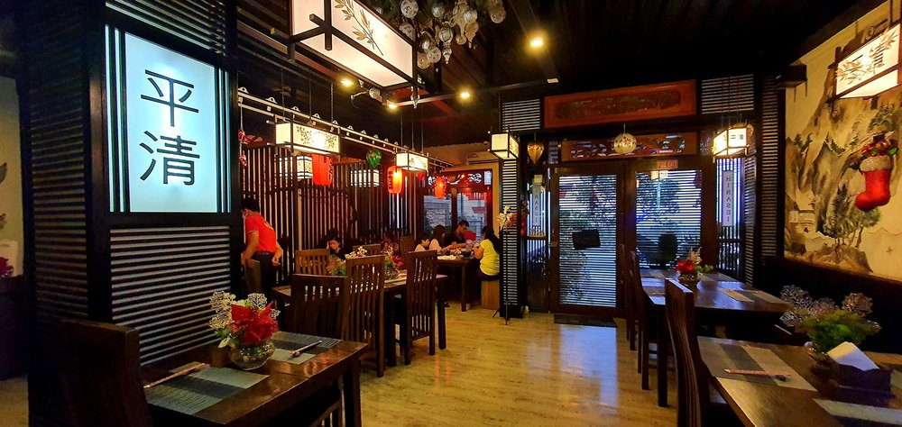Restaurant interior with a Japanese paintings and signage