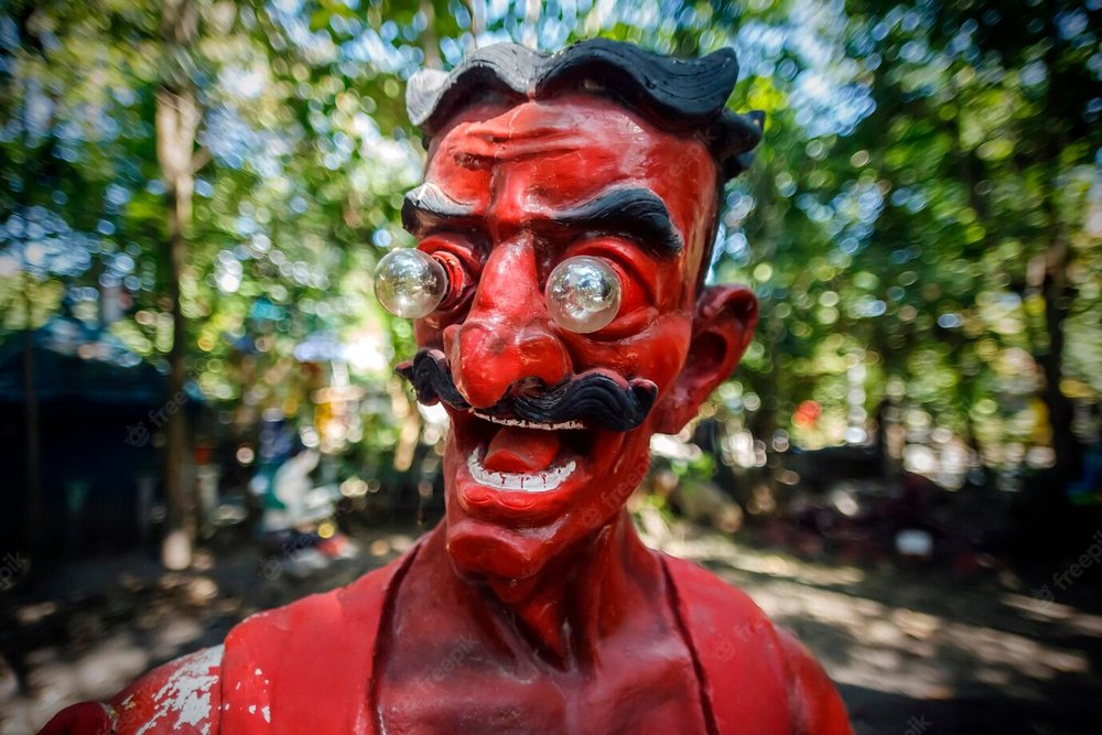 Statue of a color red demon