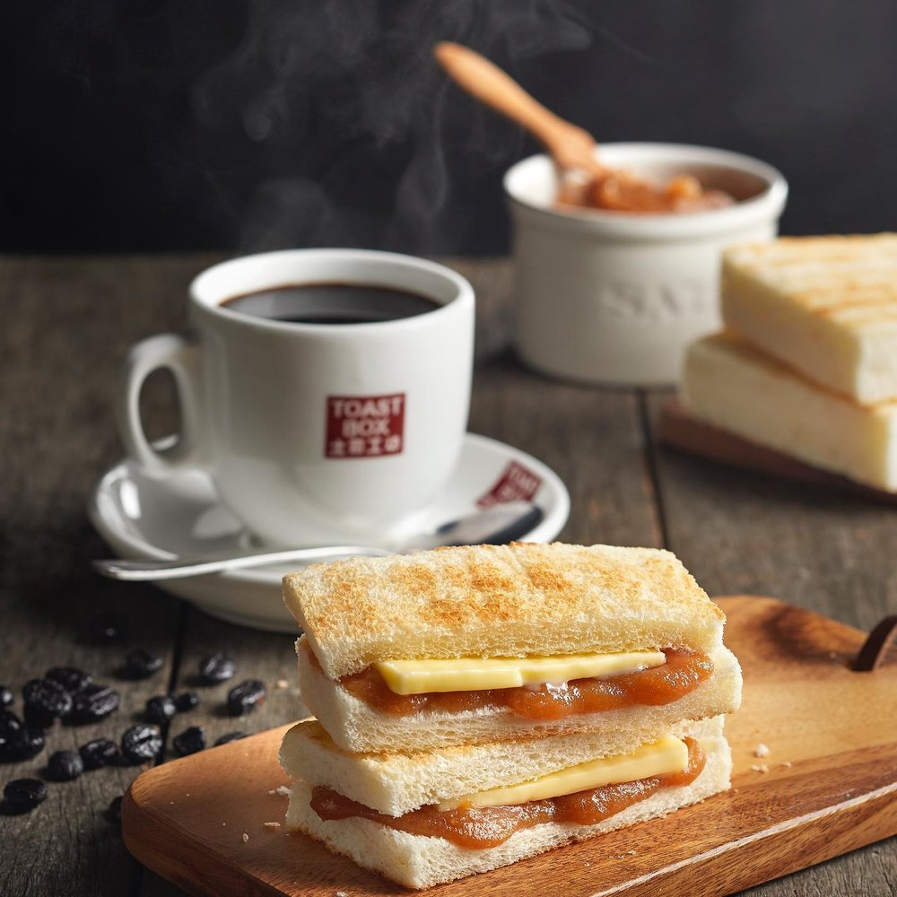 Toasted bread with cheese and strawberry jam filling