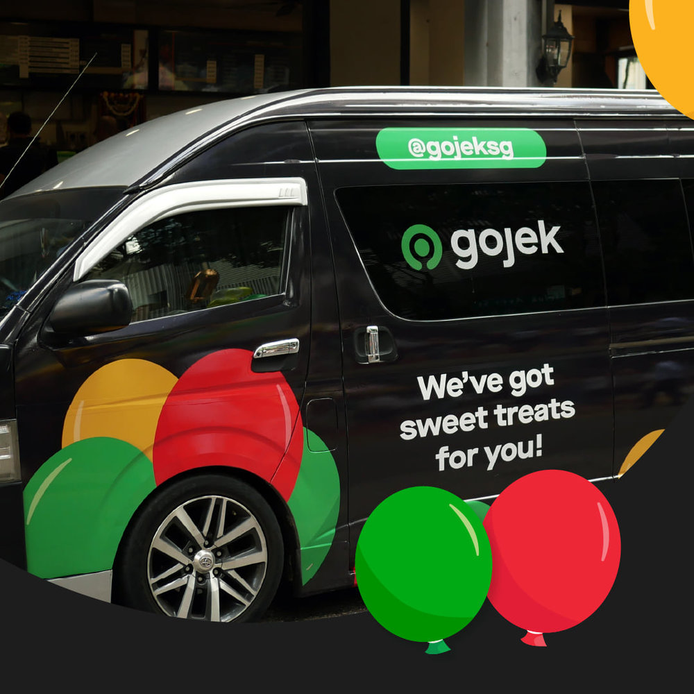 Black van with gojek with