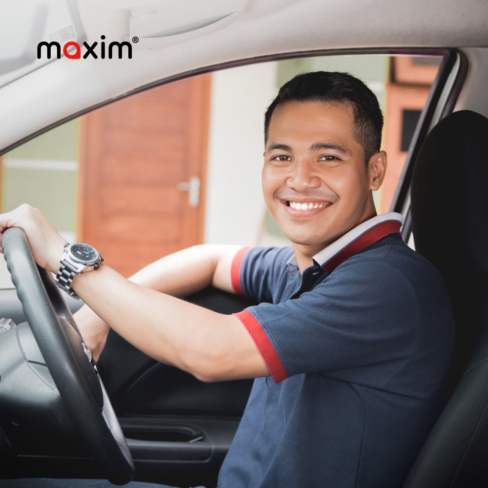 Driver driving a car