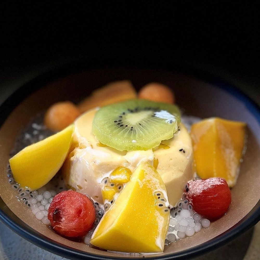 Mango with different fruits in the side