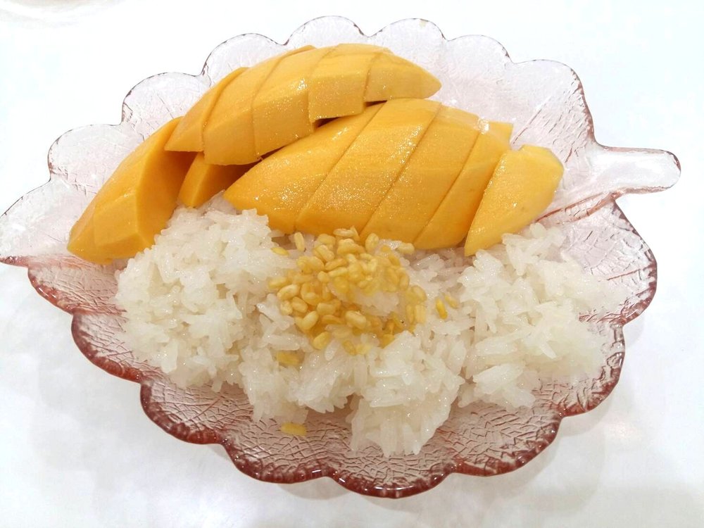 Mango on top of a sticky rice