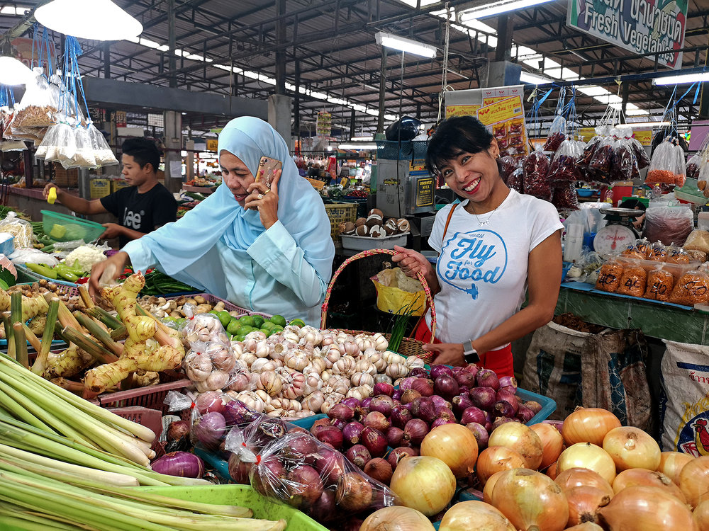 a Will Fly for Food member in a market