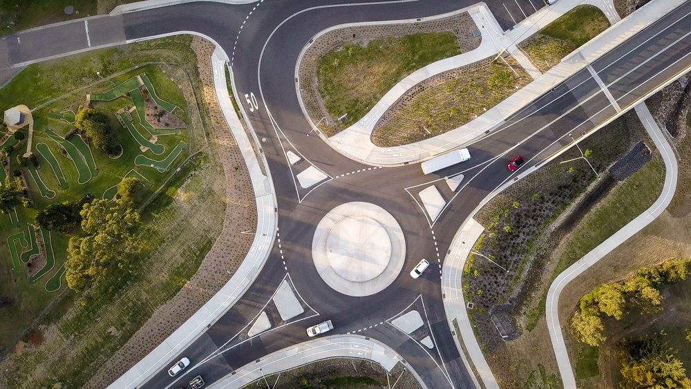 Top view of a roundabout and cars