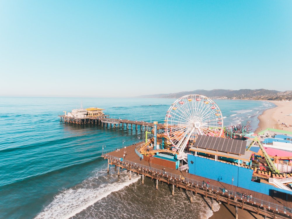 Colorful Santa Monica Pier with food stalls and rides
