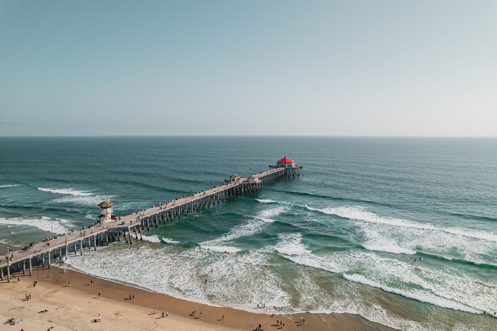 Long wooden dock on the beach