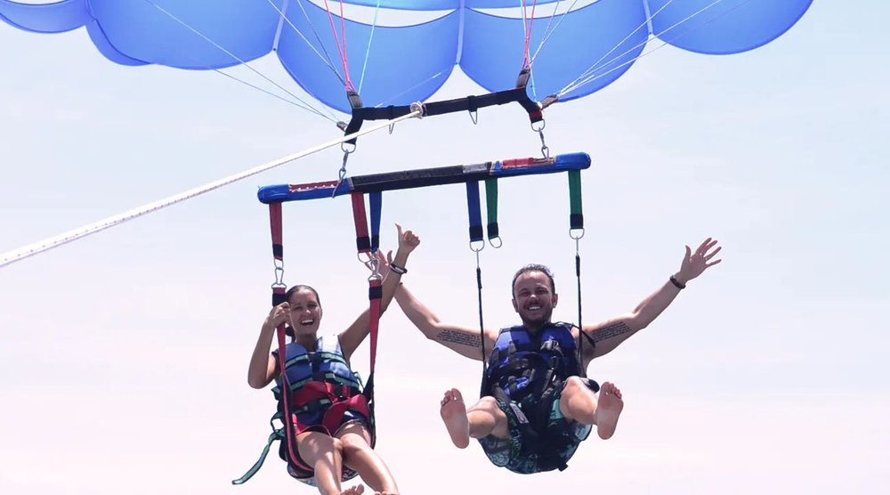 Two persons are enjoying