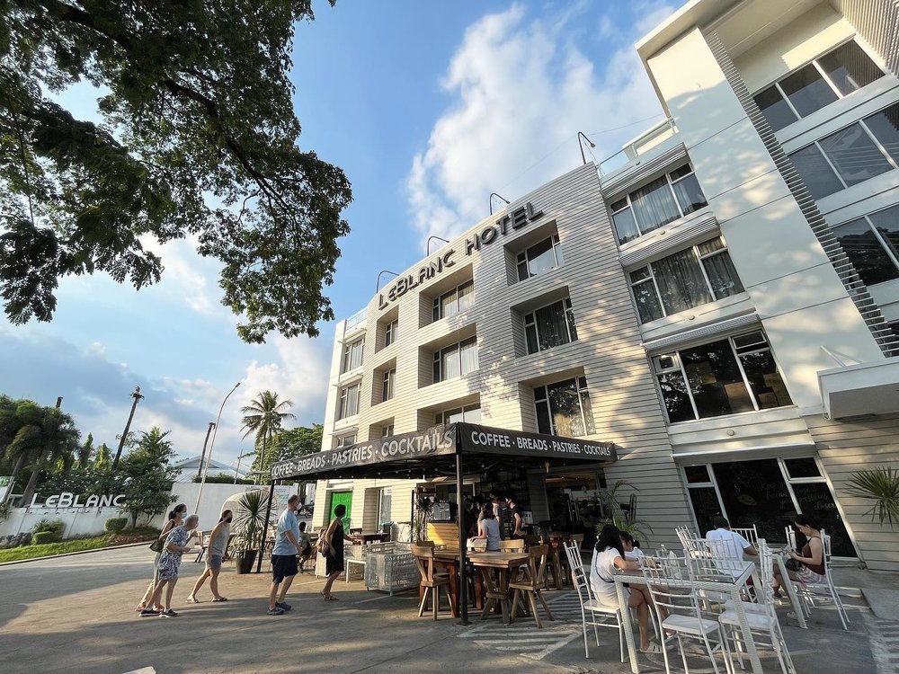 LeBlanc Hotel with people outside