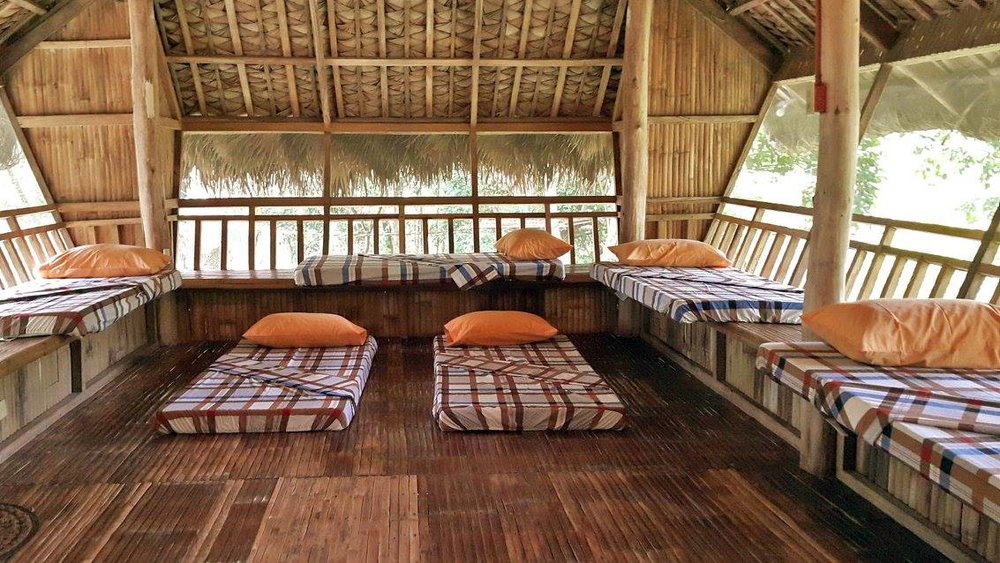 checkered beds in nipa hut 