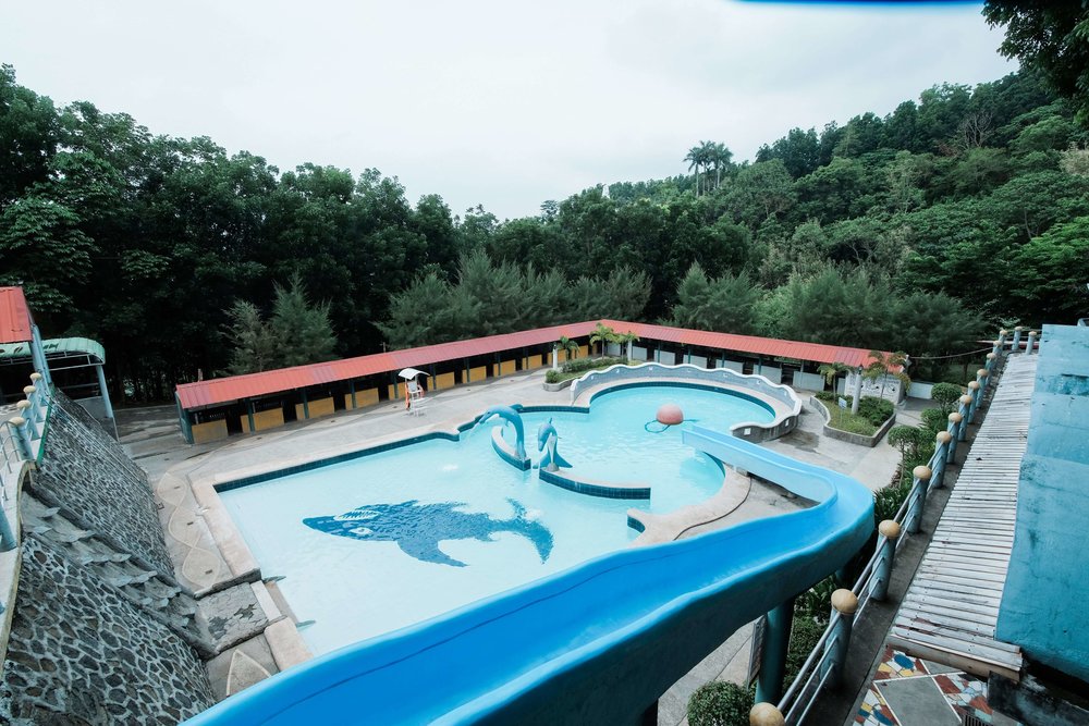 Pool with long slide