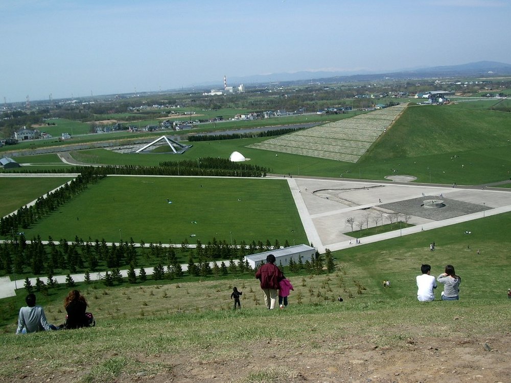 People resting on an open field