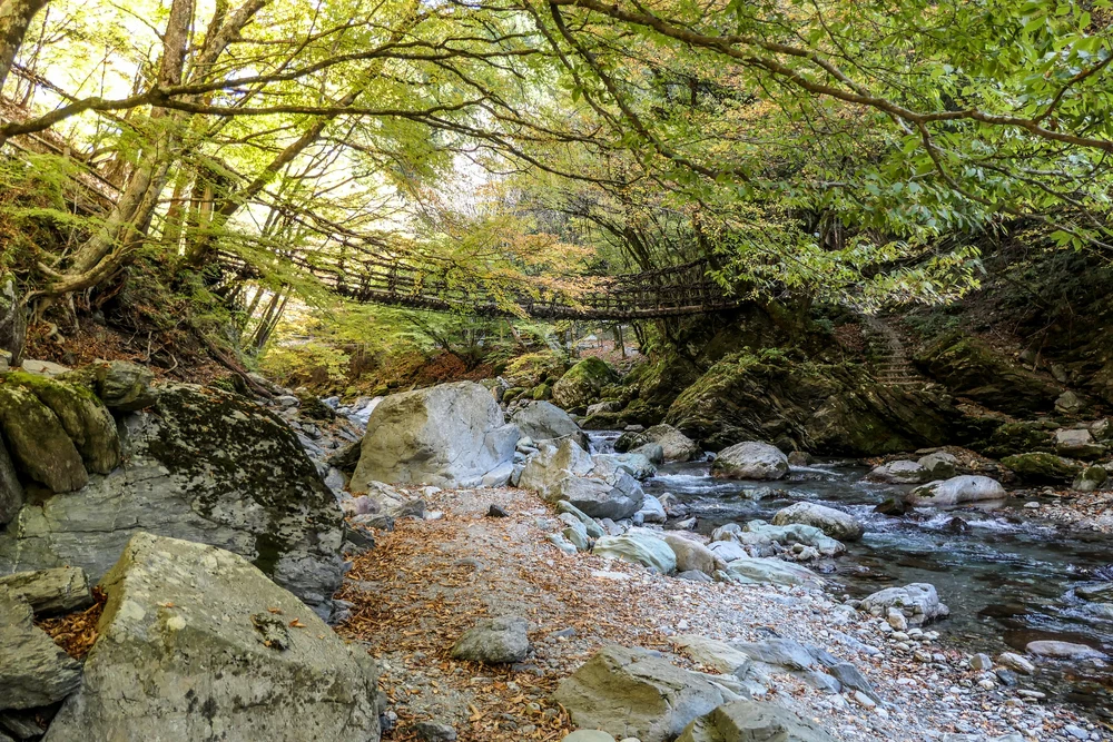 a bridge above a creak in Iya Valley