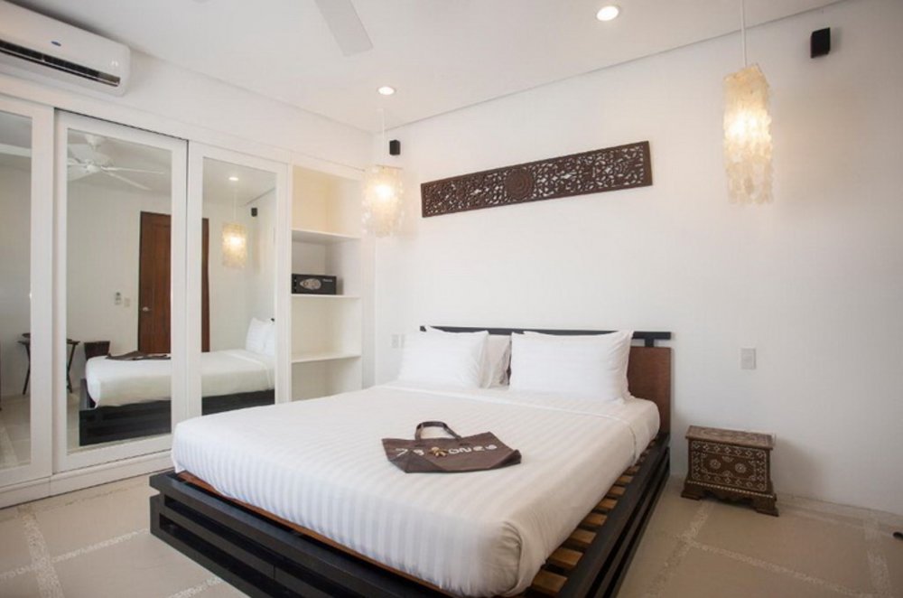 White bed with closet