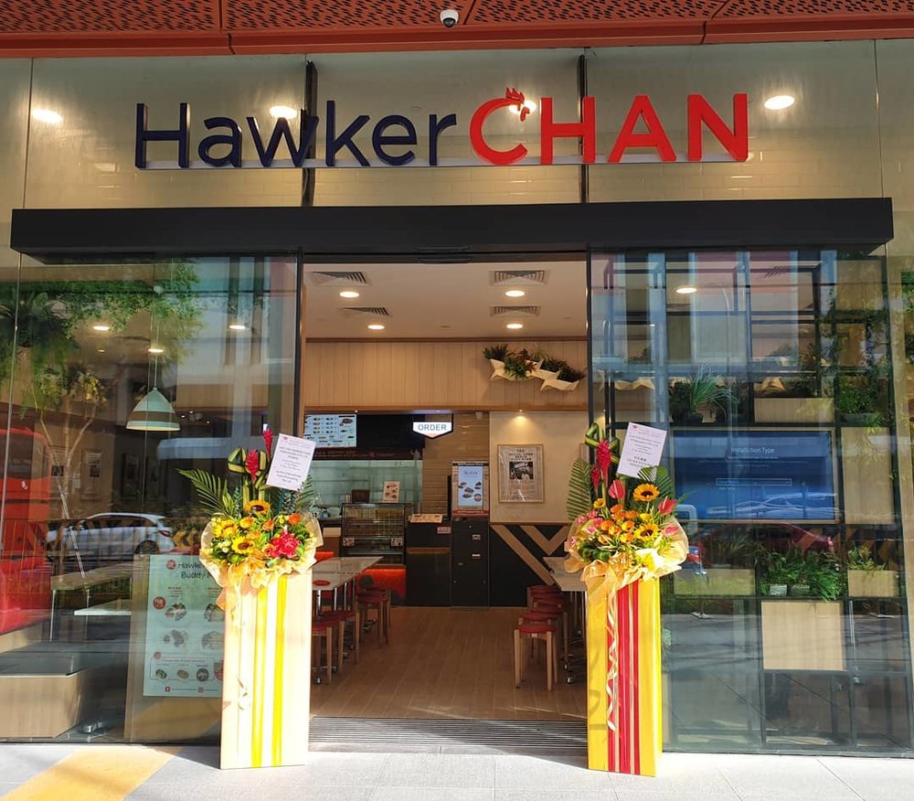 Two flowers standing outside