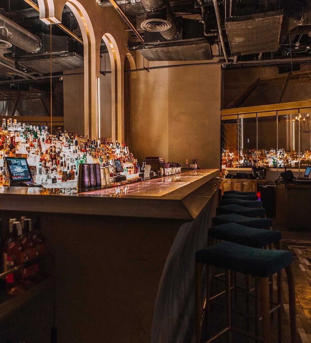 Bar with drinks and stool chair