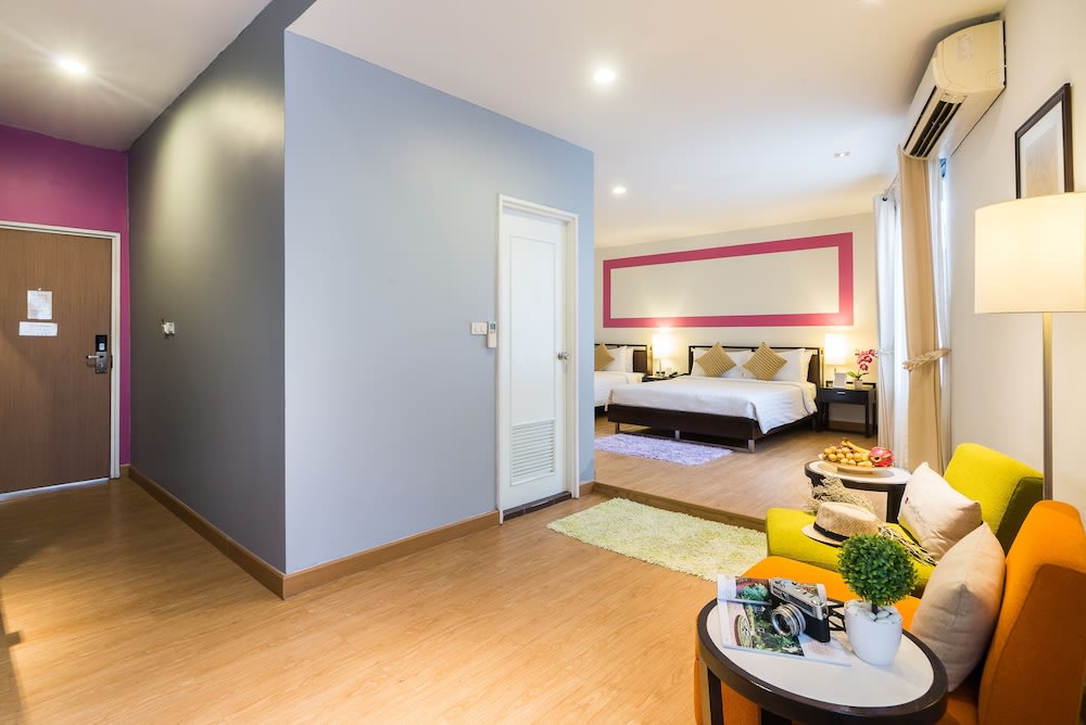 Wooden floors and multicolor couch