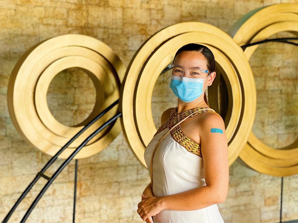 Woman wearing mask smiling
