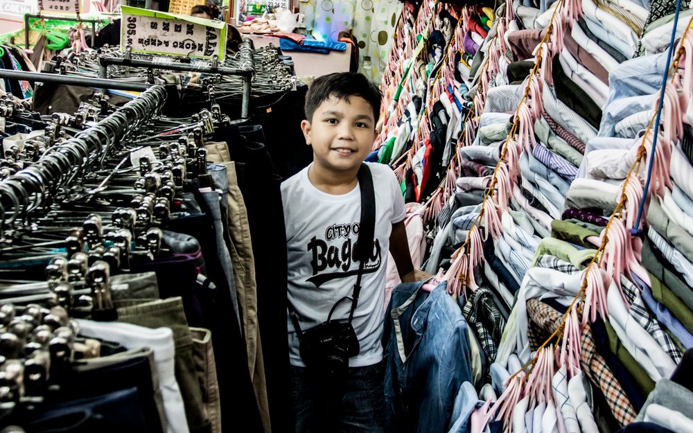 Boy inside a thrift store