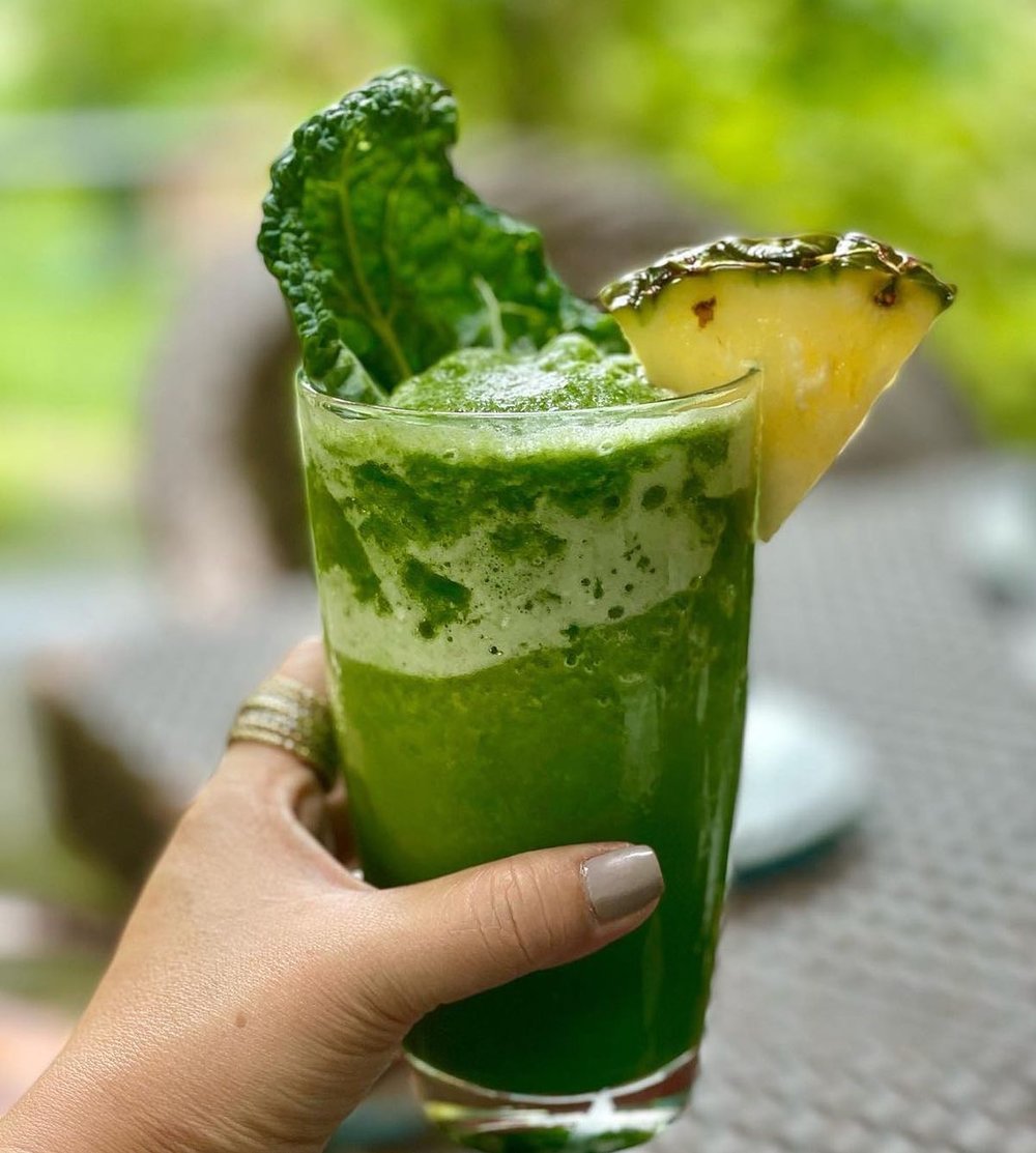 Hand holding the drink