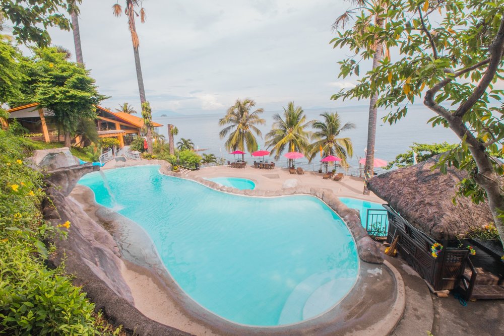 Clear pool water with rocks