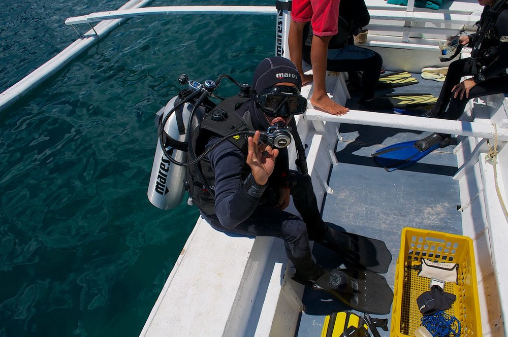 Person preparing to dive