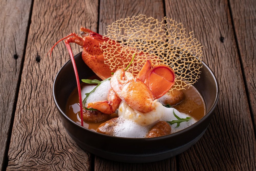 Lobster with soup dish