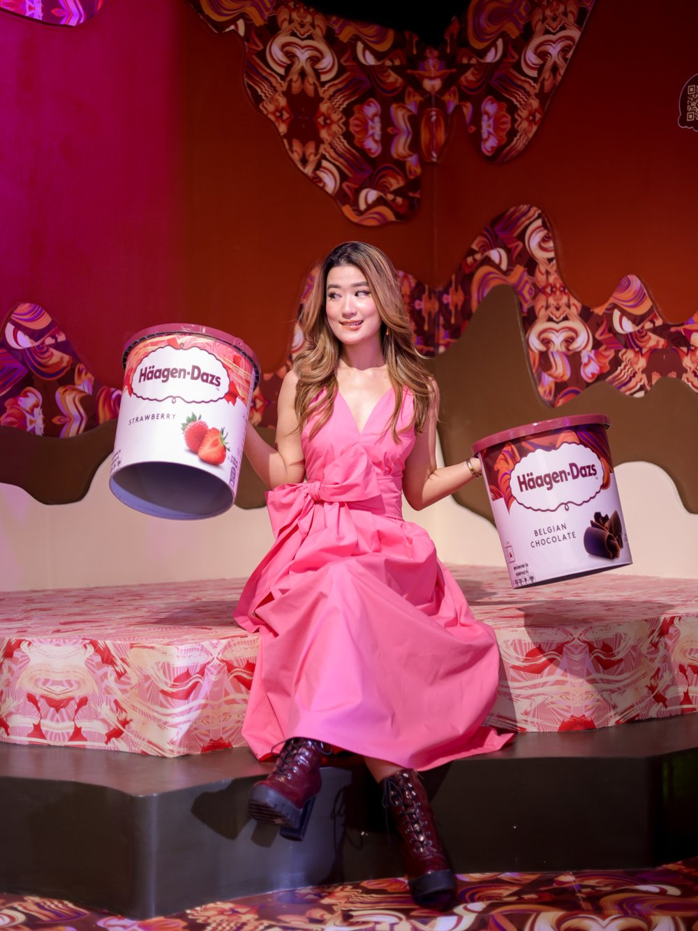 Girl holding a pale of chocolate