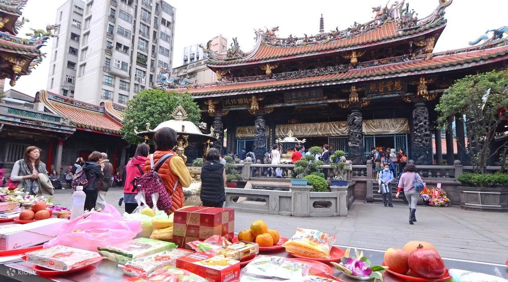 People waiting on temple