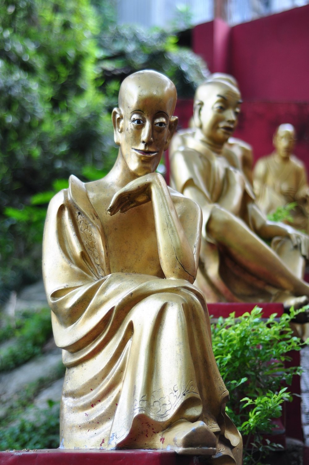 Yellow posing buddha