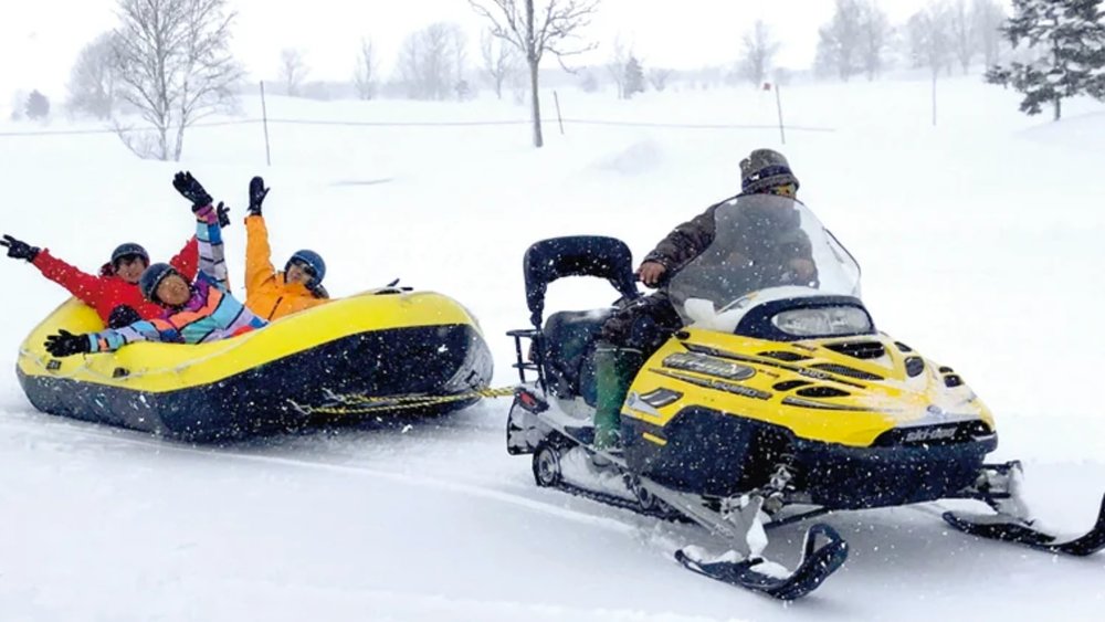 Kids will enjoy exploring the snow on an exhilarating rubber boat ride.