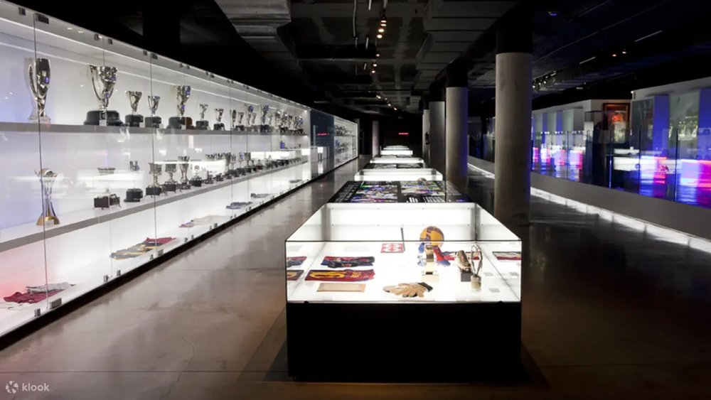 a room full of jerseys, gloves, trophies in Camp Nou