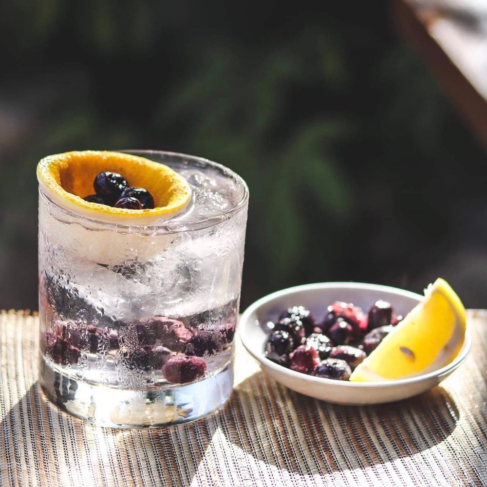 Clear drink with blueberry