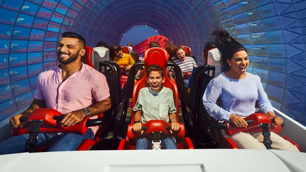 people riding the roller coasters at Ferrari World
