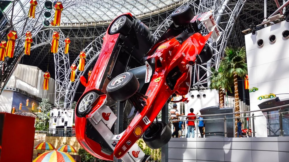 race cars on display at Ferrari World