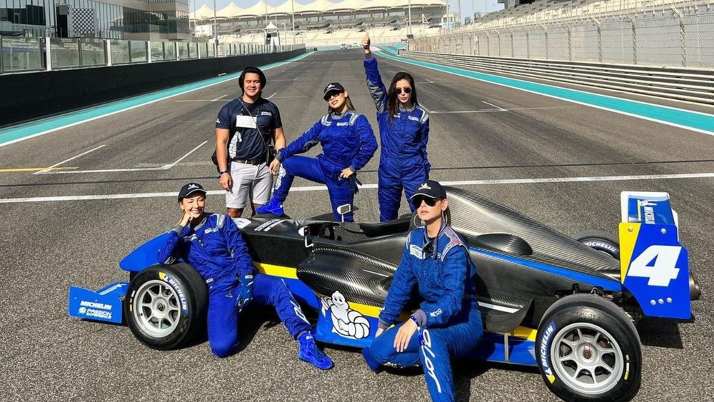 people posing at Yas Marina Circuit
