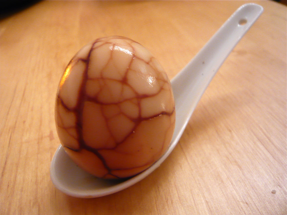 Tea egg on a ladle