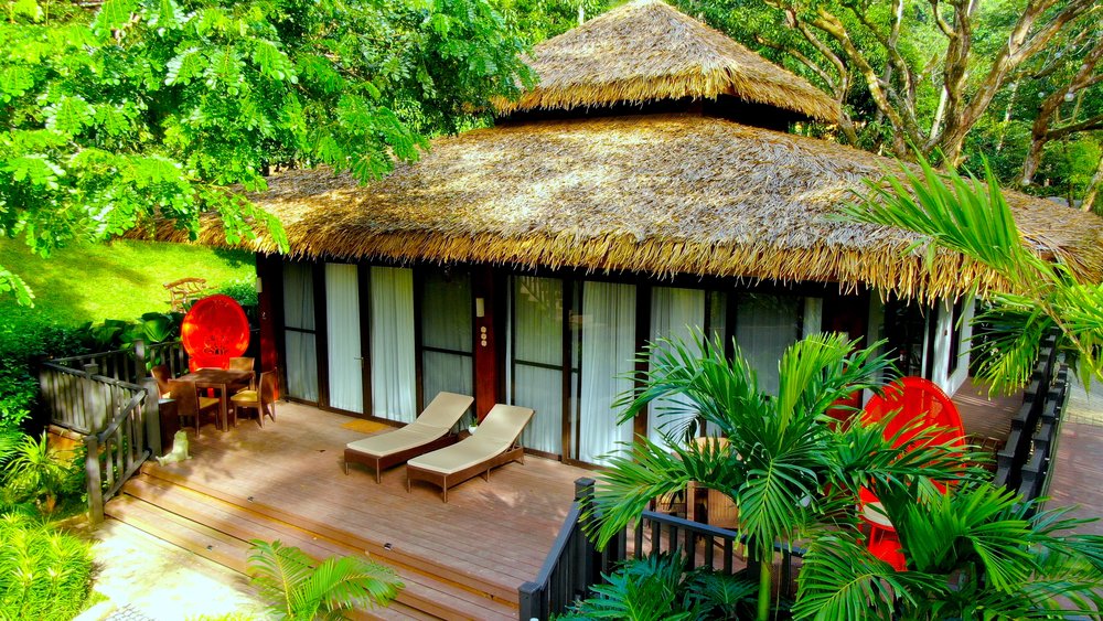 aerial shot of exterior of villa and patio