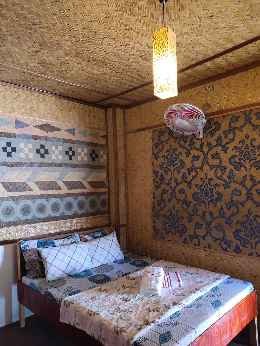 Room with wooden interior and nipa accent