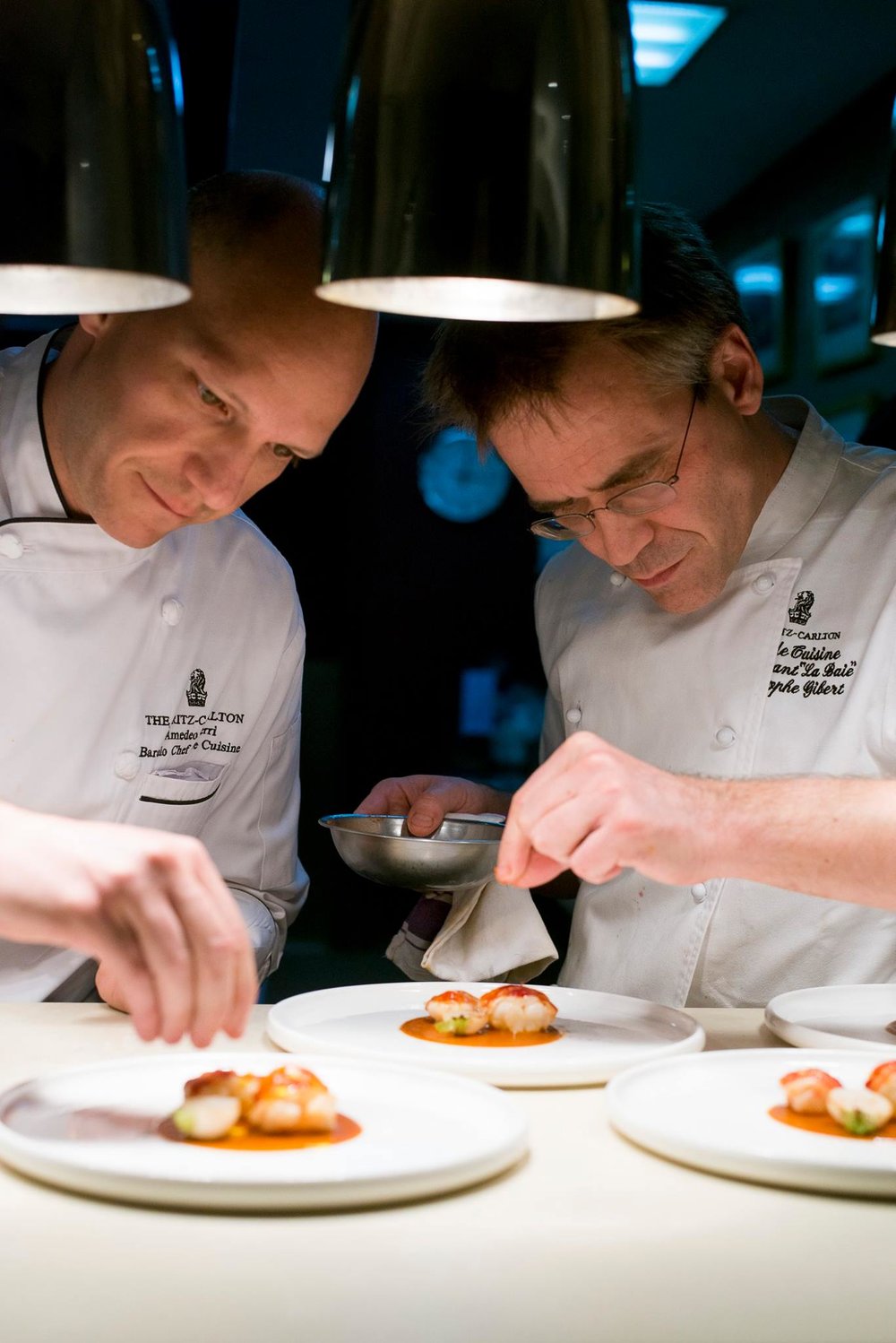 2 Chef preparing a dish