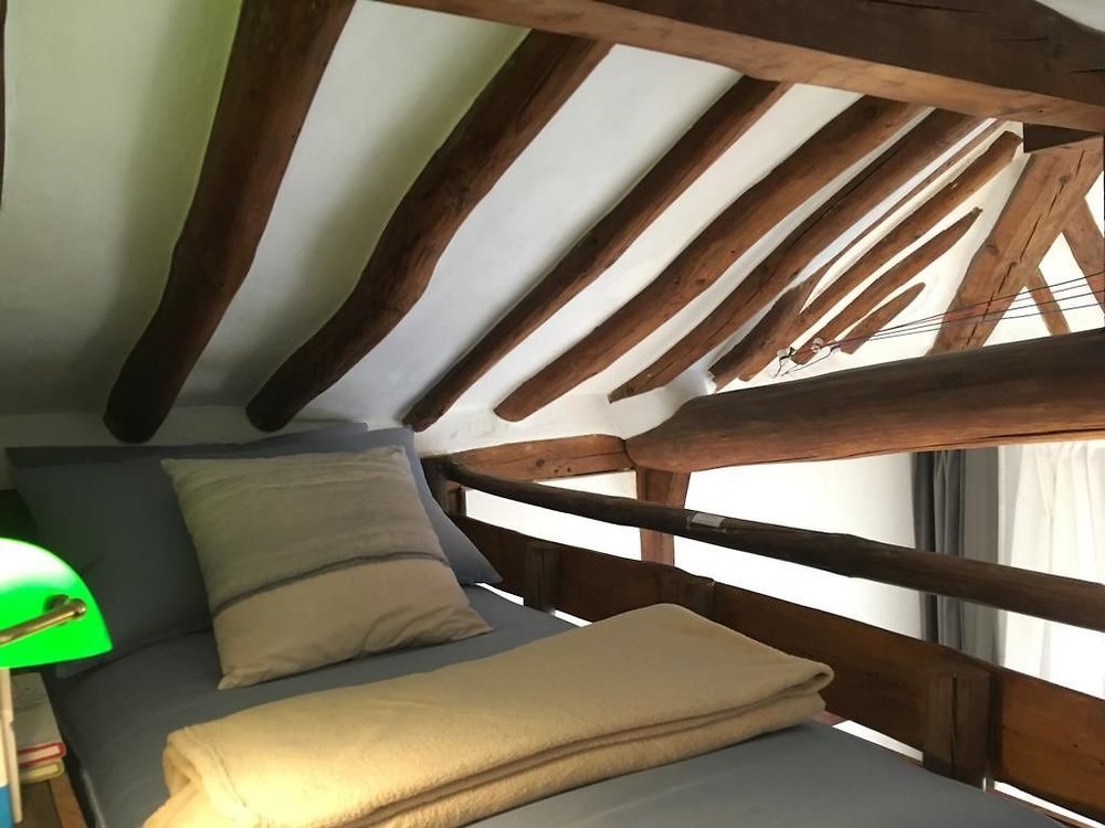 Bed near ceiling