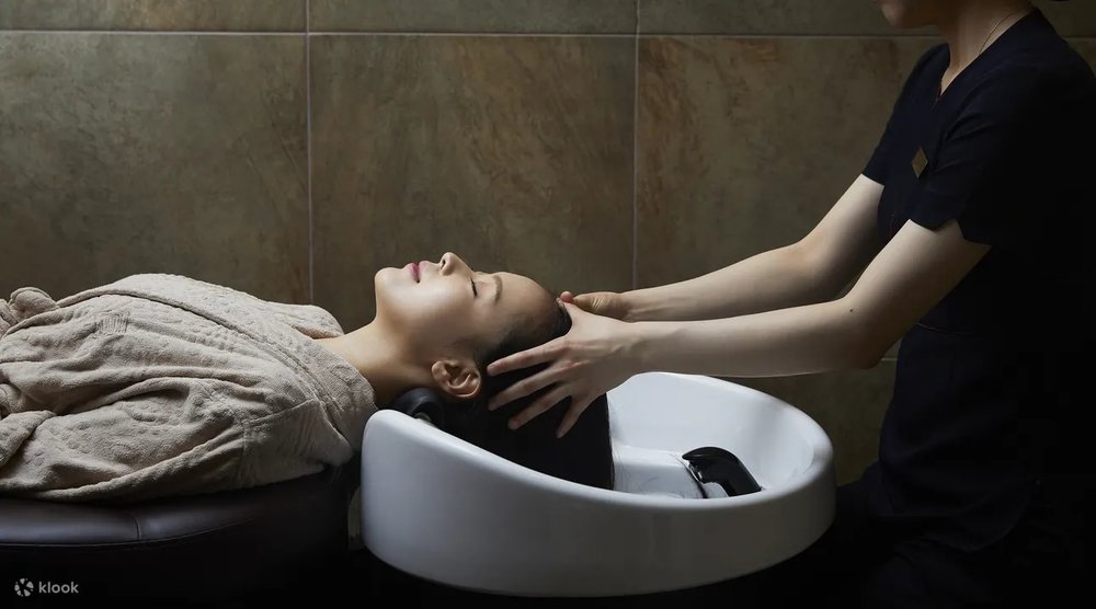 Woman getting a hair treatment