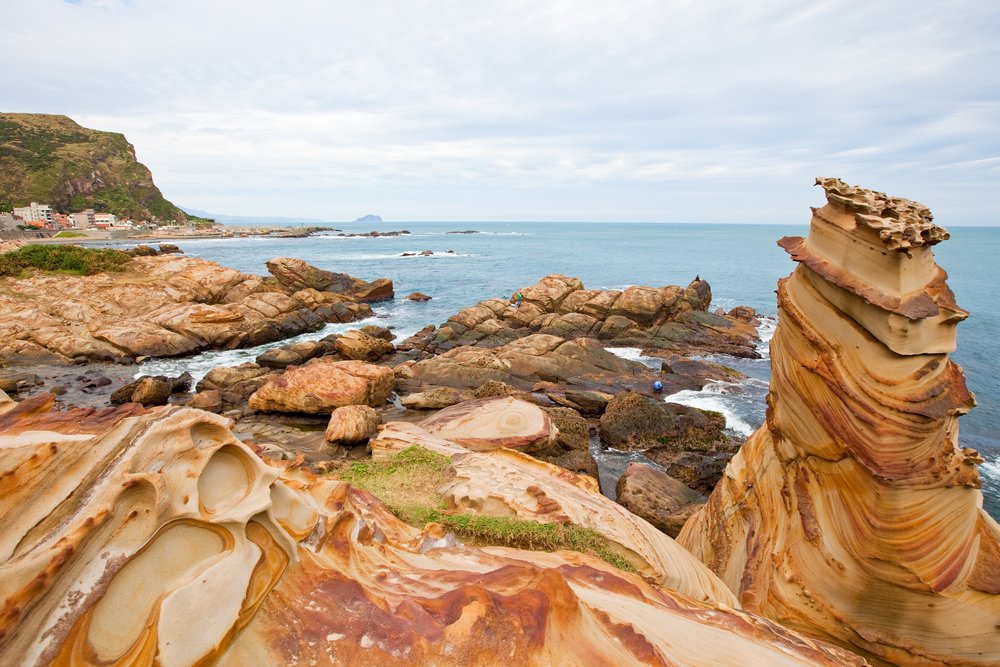 Rock formations standing right beside the sea