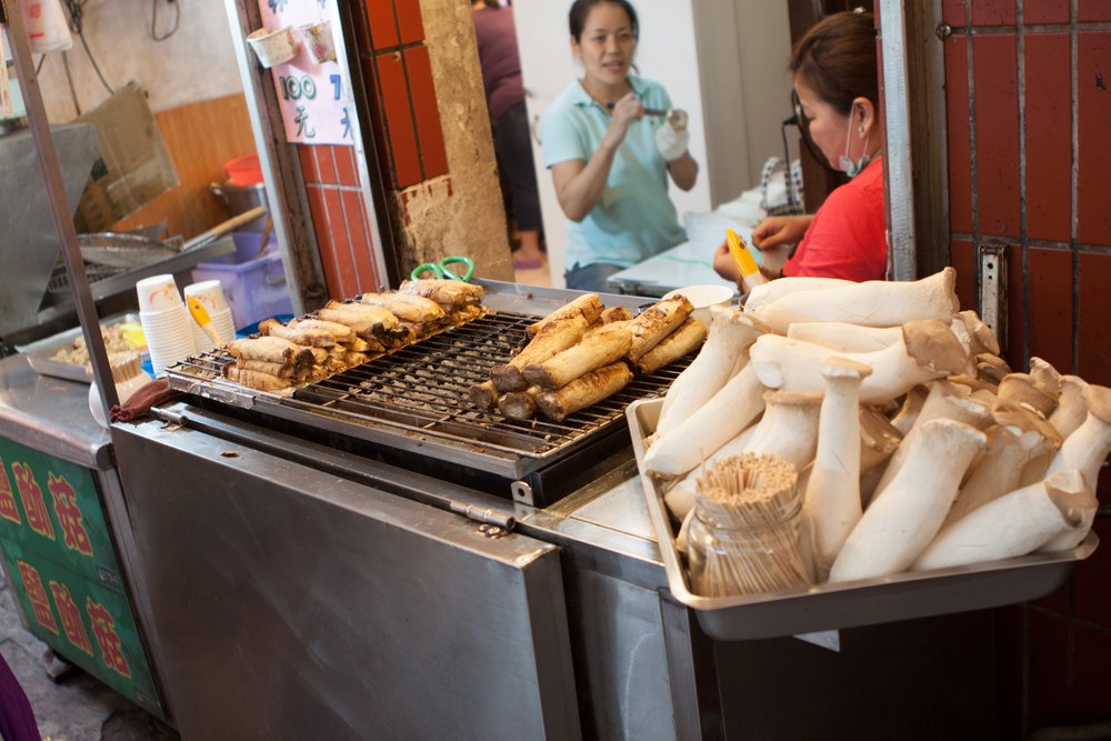 Mushroom snacks on a grill 
