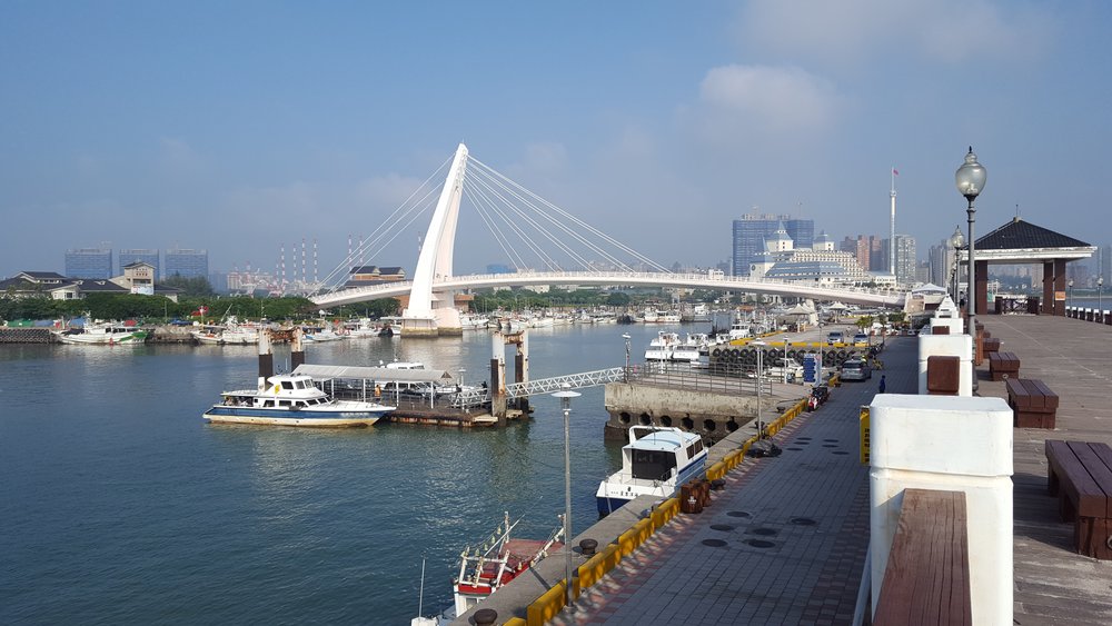 A bridge and boats on the river